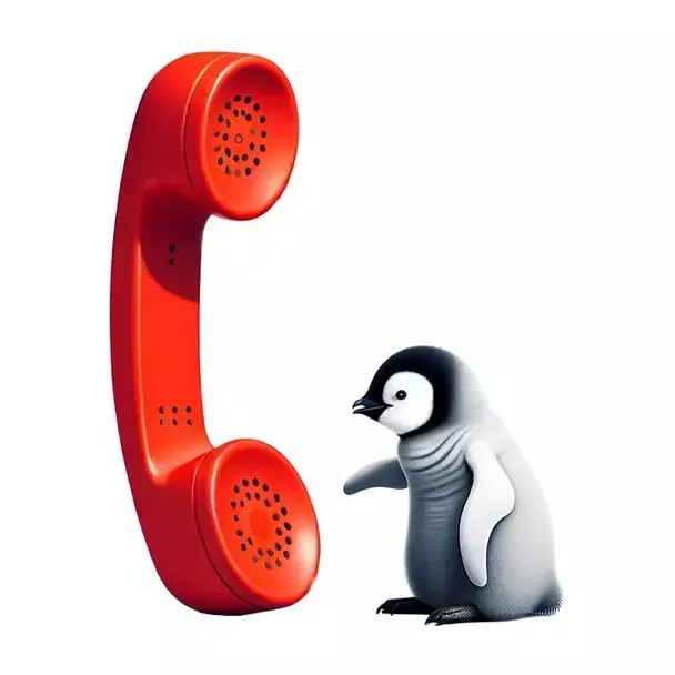 Ein Baby-Pinguin geht ans Telefon